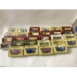 Box of various Matchbox and other toy vans in original packaging