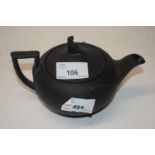 Wedgwood black basalt teapot with lady finial, early 20th Century (chip to spout)