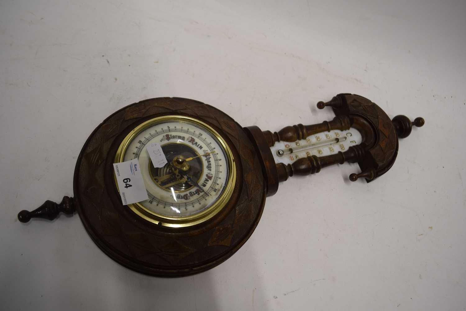 Late 19th Century barometer in carved case