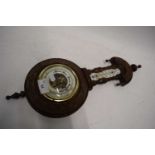 Late 19th Century barometer in carved case
