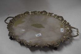 Large silver plated tray with scalloped border and handles with inscription dated 1914, 59cm width