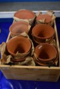 Box of terracotta plant pots