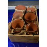 Box of terracotta plant pots