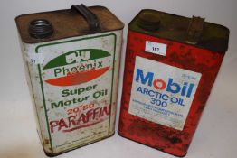 Two vintage motor oil cans