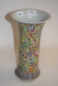 Chinese porcelain vase of cylindrical shape, the yellow ground with floral decoration, probably