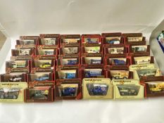 Quantity of Matchbox models of Yesteryear toy vans in original packaging