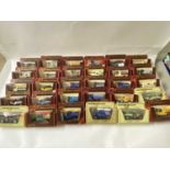 Quantity of Matchbox models of Yesteryear toy vans in original packaging