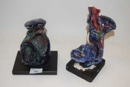 A pair of abstract figures