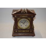 Late 19th Century mantel clock with oak and brass mounted architectural case