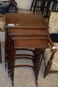 Nest of four mahogany occasional tables