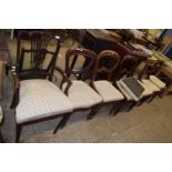 Harlequin set of six 19th Century dining chairs together with a further carver chair, all
