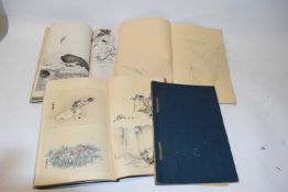 Three Japanese picture books with a range of various images, figures, birds and others