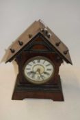 Late 19th Century mantel clock in an architectural metal mounted case