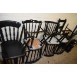 Six various black painted dining chairs