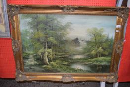 James (Contemporary) study of a woodland scene with distant mountain, oil on canvas, gilt framed