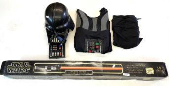 A 2003 replica Darth Vader Force FX Lightsaber, in original box with stand by Master Replicas.