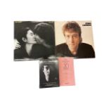 A mixed lot of John Lennon memorabilia, to include: - 'The Messenger' media box set in sealed