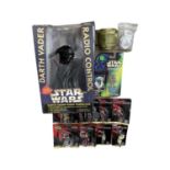 A mixed lot of Star Wars collectibles, to include: - A boxed Hitari radio-controlled Darth Vader - A
