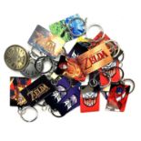 A quantity of metal keyrings of video game / cartoon interest, to include: - The Legend of Zelda -