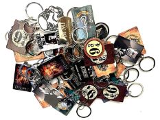 A quantity of metal keyrings of film interest, to include: - Star Wars - Harry Potter - James Bond