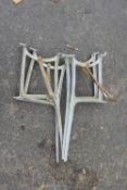 Two pairs of aluminium bench ends