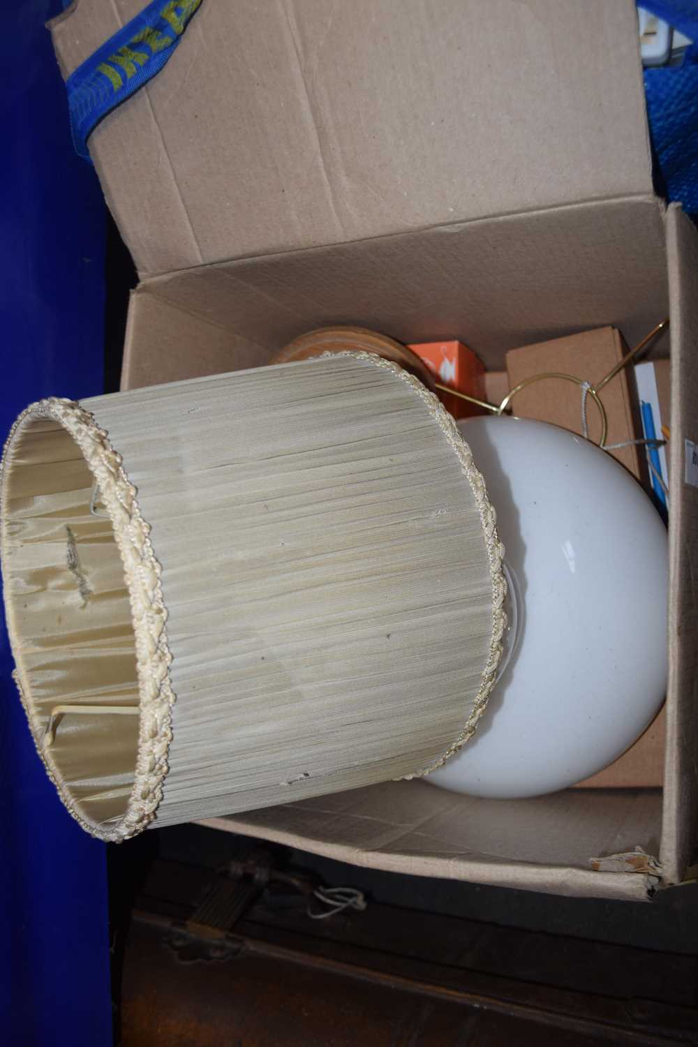 One box containing a modern oil lamp, table lamp etc