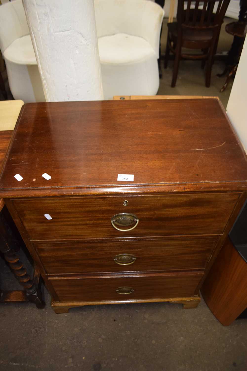 Late 19th or early 20th Century mahogany three drawer chest on bracket feet