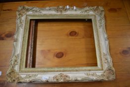 Vintage foliate moulded picture frame and one other (2)