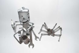A novelty metal figure formed from various spanners, bolts and other metal items together with a