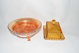 Orange Carnival glass bowl together with a further glass butter dish
