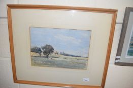 20th Century school study of a pasture scene with distant Church, watercolour, unsigned, framed