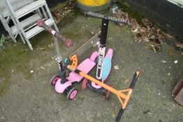 Three child's scooters