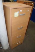 Light wood finish four drawer filing cabinet