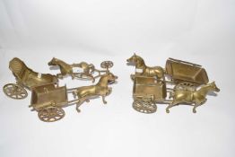 Collection of brass horses with various carriages and carts