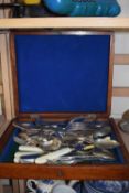 Wooden case of assorted cutlery