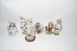 Collection of various porcelain figures and a porcelain flower group