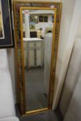 Modern rectangular bevelled wall mirror in floral decorated frame