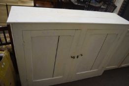 Painted pine two door cupboard, 140cm wide