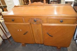 Oak veneered three drawer, two door sideboard