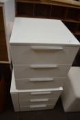 Pair of white three drawer bedside cabinets