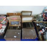 Six cases of photographic glass slides