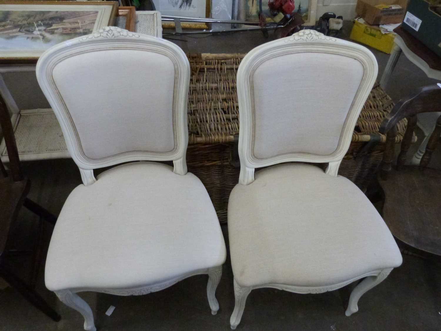 Pair of modern continental style dining chairs with cream finish frames