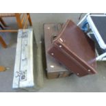 Vintage metal suitcase and two others