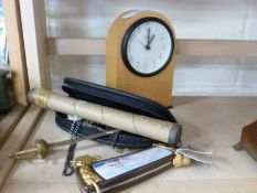 Mixed Lot: A Cutty Sark novelty pocket knife, small mantel clock, a paper knife, a vintage glass