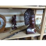 Mixed Lot: A carved Balinese small root wood figure, hardwood paper knife and glove stretchers