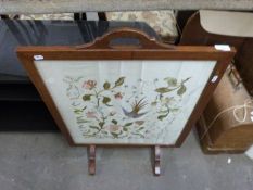 Needlework fire screen