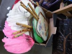 Box of various feather and fabric fans