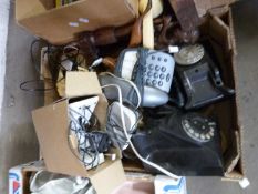 One box of vintage telephones, carved ethnic figures etc