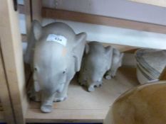 Set of three modern pottery elephants