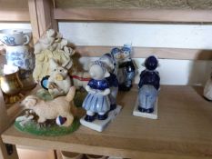 Mixed Lot: Various modern Dutch pottery figures, a Piggin figure and a further puppy ornament (5)